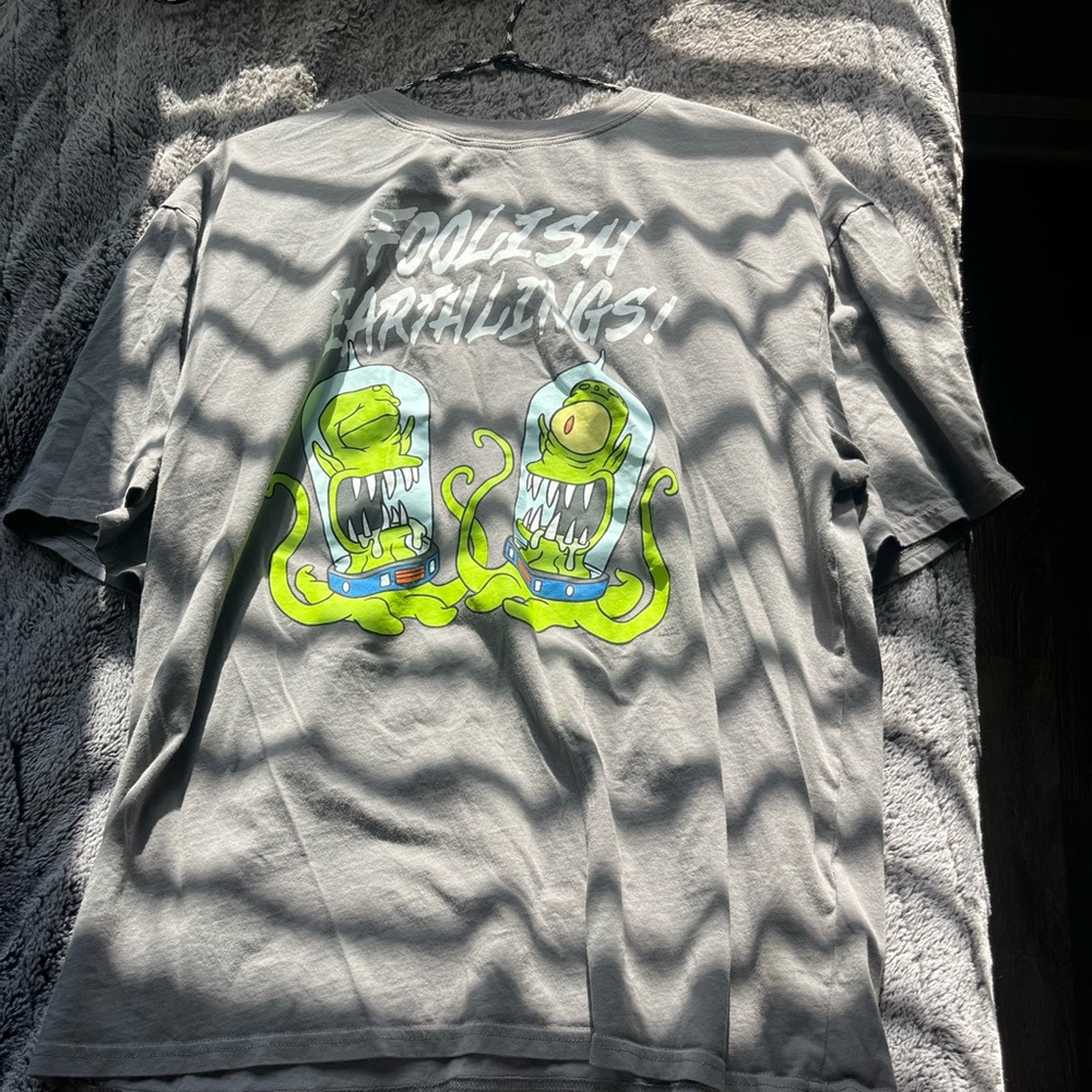 Foolish earthlings graphic tee.